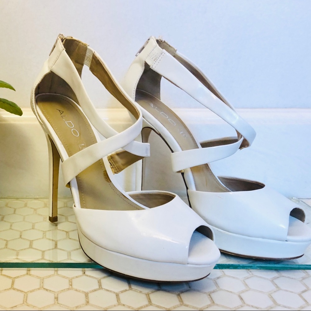 White cross strap aldo stilettos.